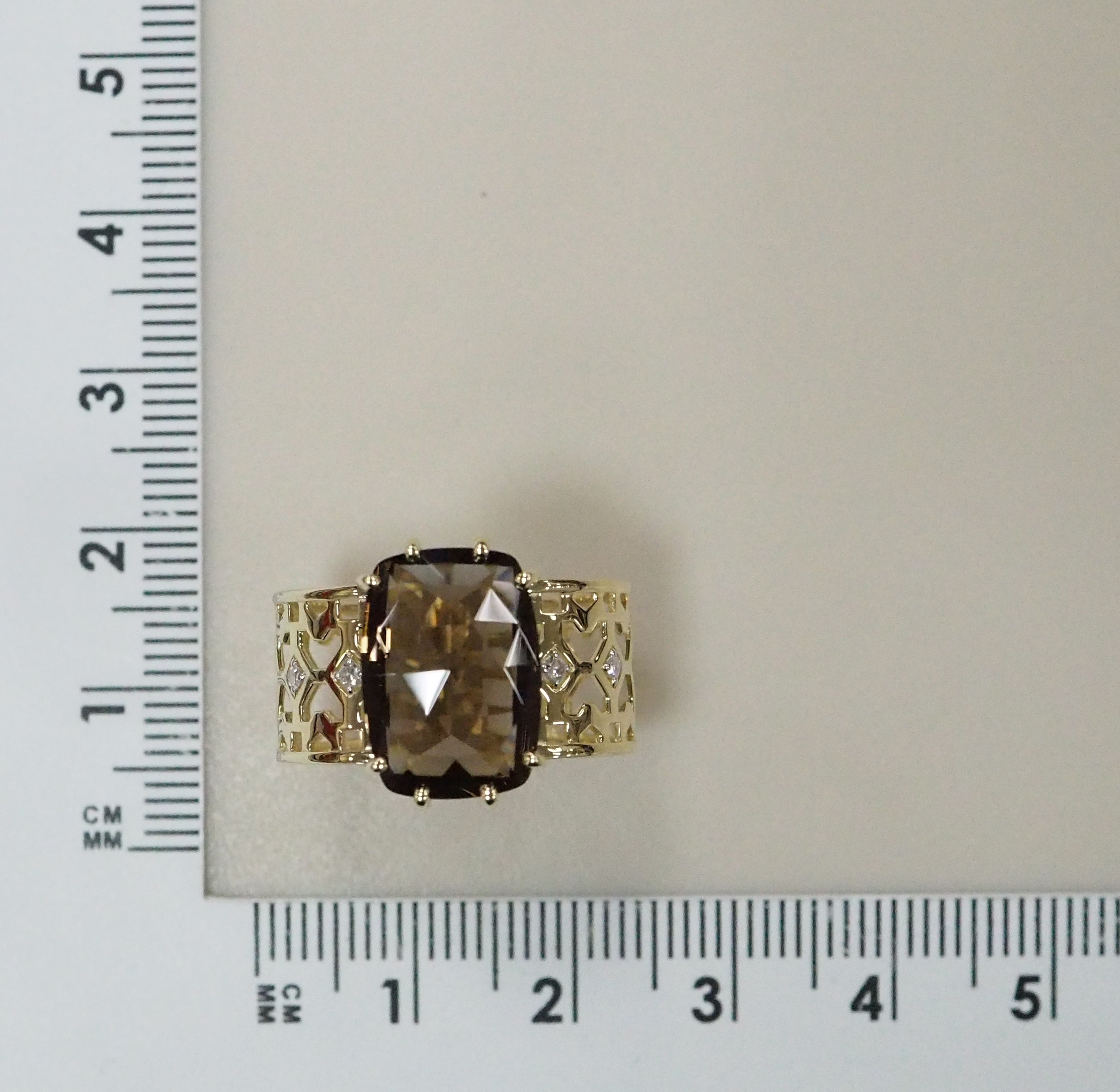 Кольцо из желтого золота с раухтопазом